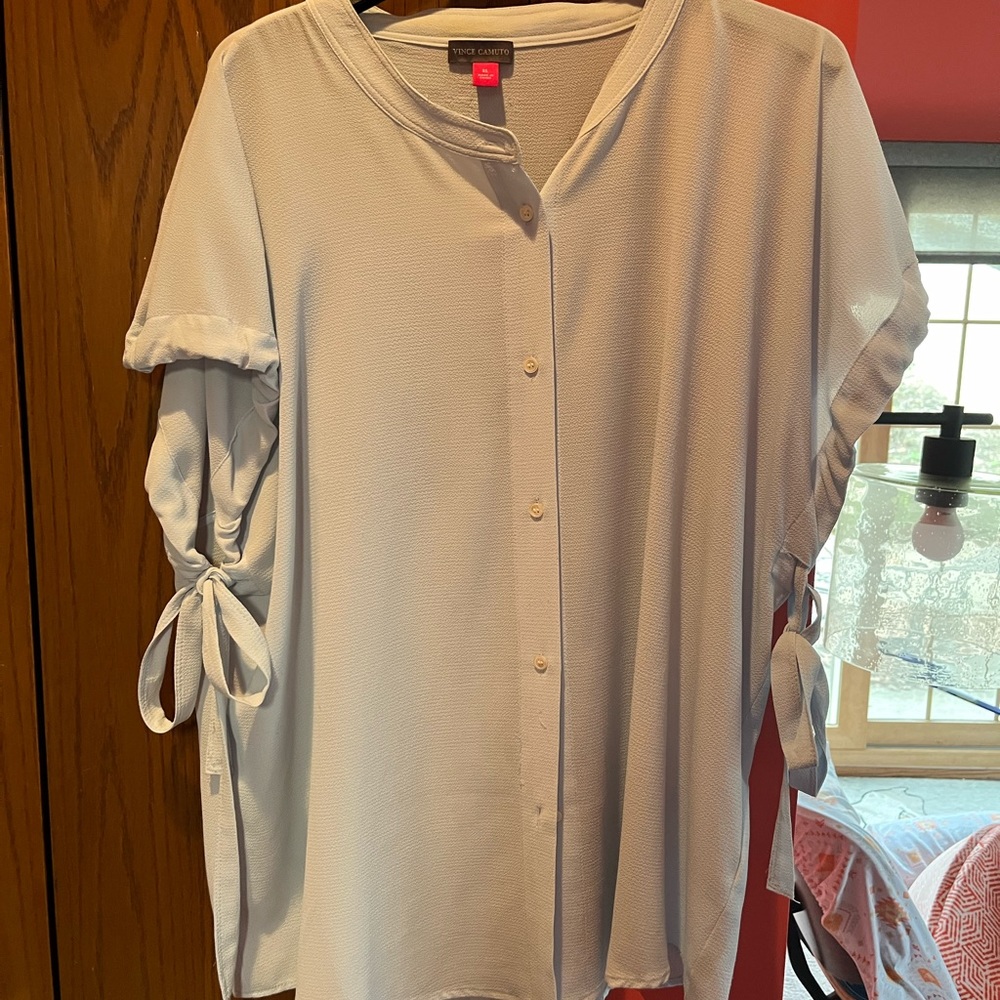 Light blue blouse - cute ties on the sleeves - hidden front buttons